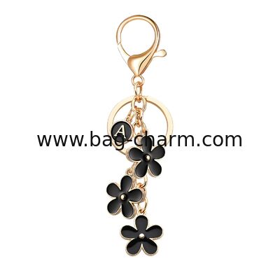 GUGEER Cute Flower Initial Letter Keychain para mujeres, amuletos de flores, bolsos y carteras amuletos para bolsos y mochilas accesorios