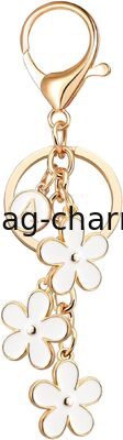 GUGEER Cute Flower Initial Letter Keychain para mujeres, amuletos de flores, bolsos y carteras amuletos para bolsos y mochilas accesorios